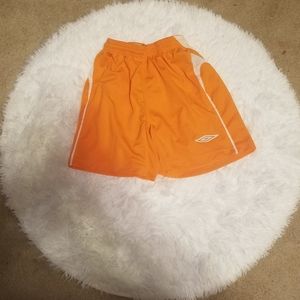 Boy's Orange Umbro Shorts. Size Small.